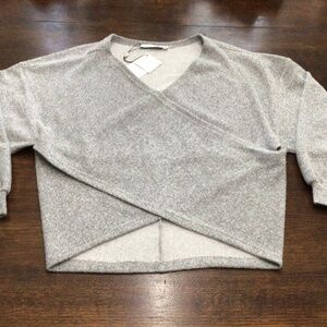 By egress light gray wrap sweater. Size extra small. New with tags.